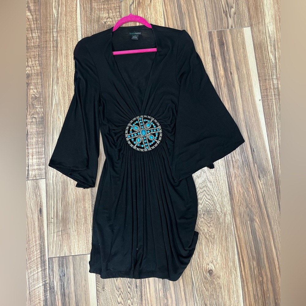 Turquoise embellished black dress